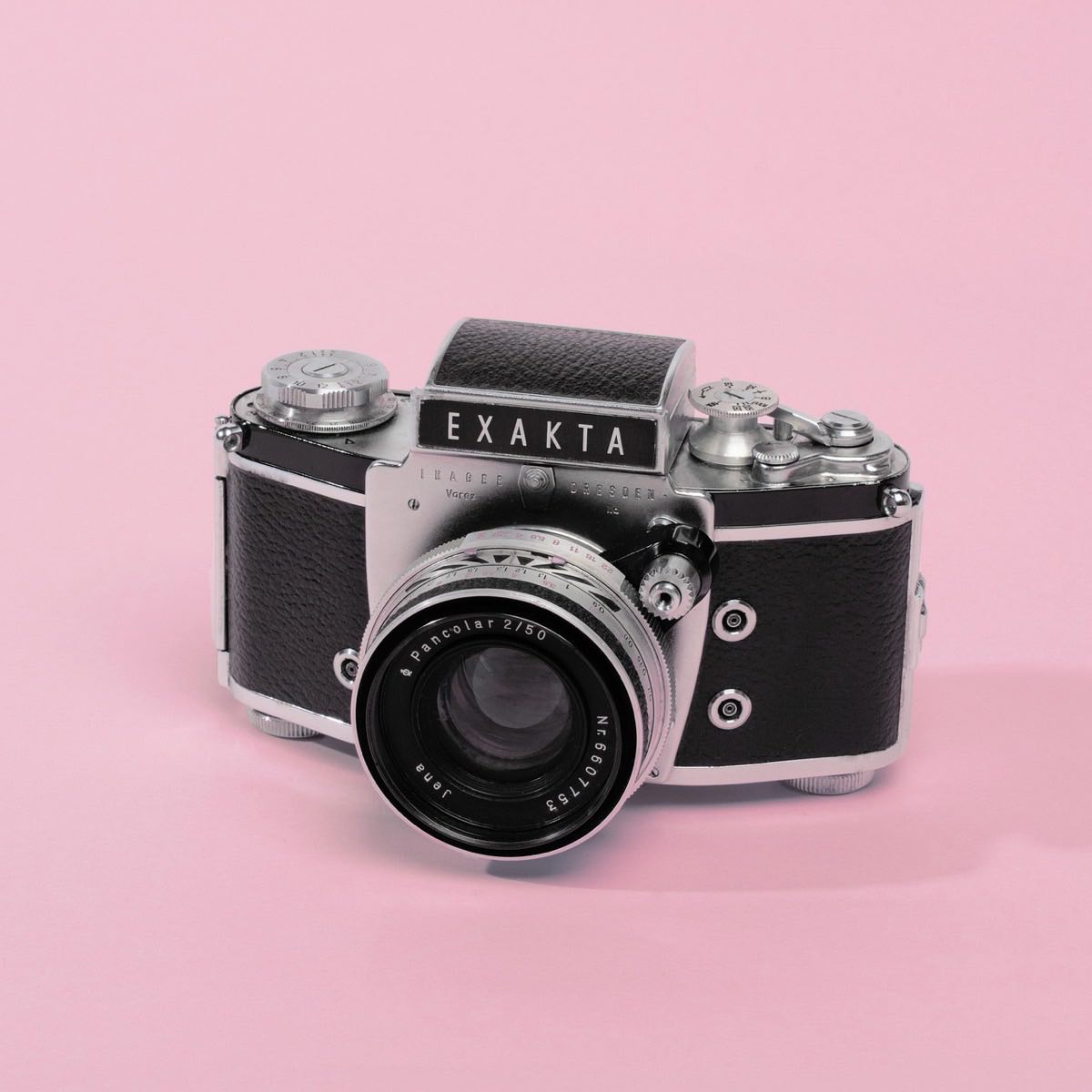 camera, floral background, product, pink